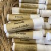 Vegan friendly lip balm, scented in sweetie, labelled with a kraft label.